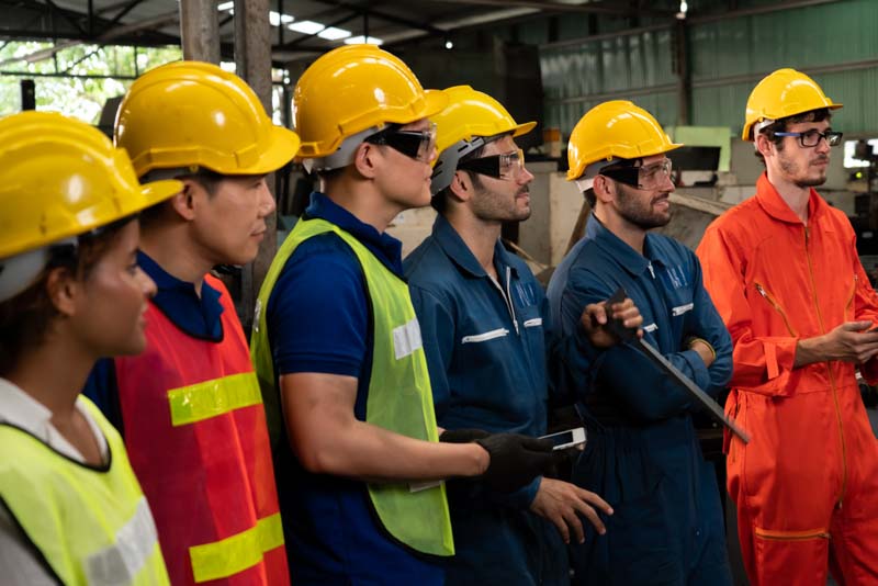 Workers wearing safety apparel