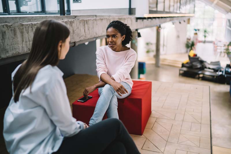 Two people in a discussion